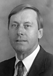 [Photograph of District Court Judge]