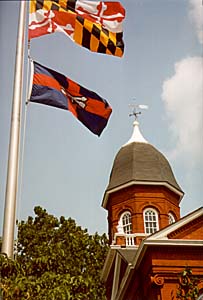 [color photograph of Worcester County Courthouse dome with flags]